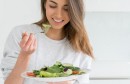 Woman dieting and eating a salad